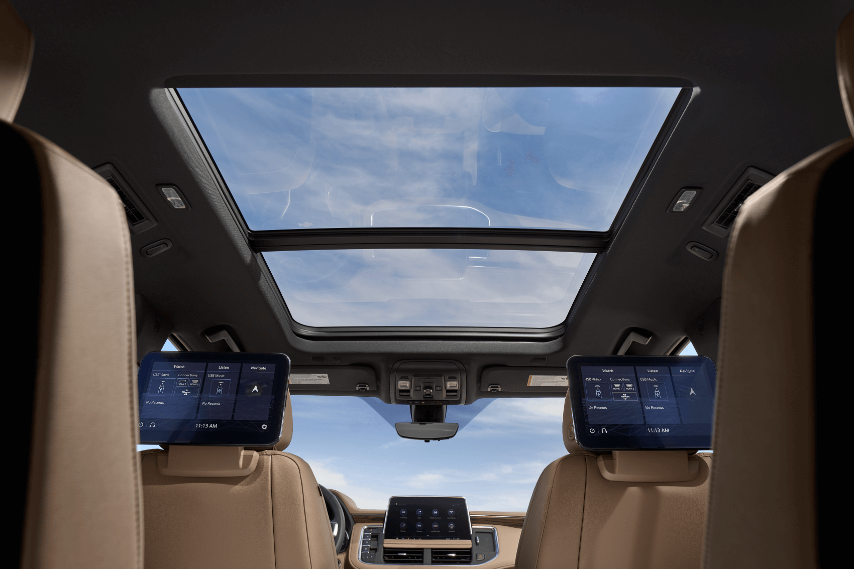 the chevy suburban has two large sunroofs and screens for your backseat passengers