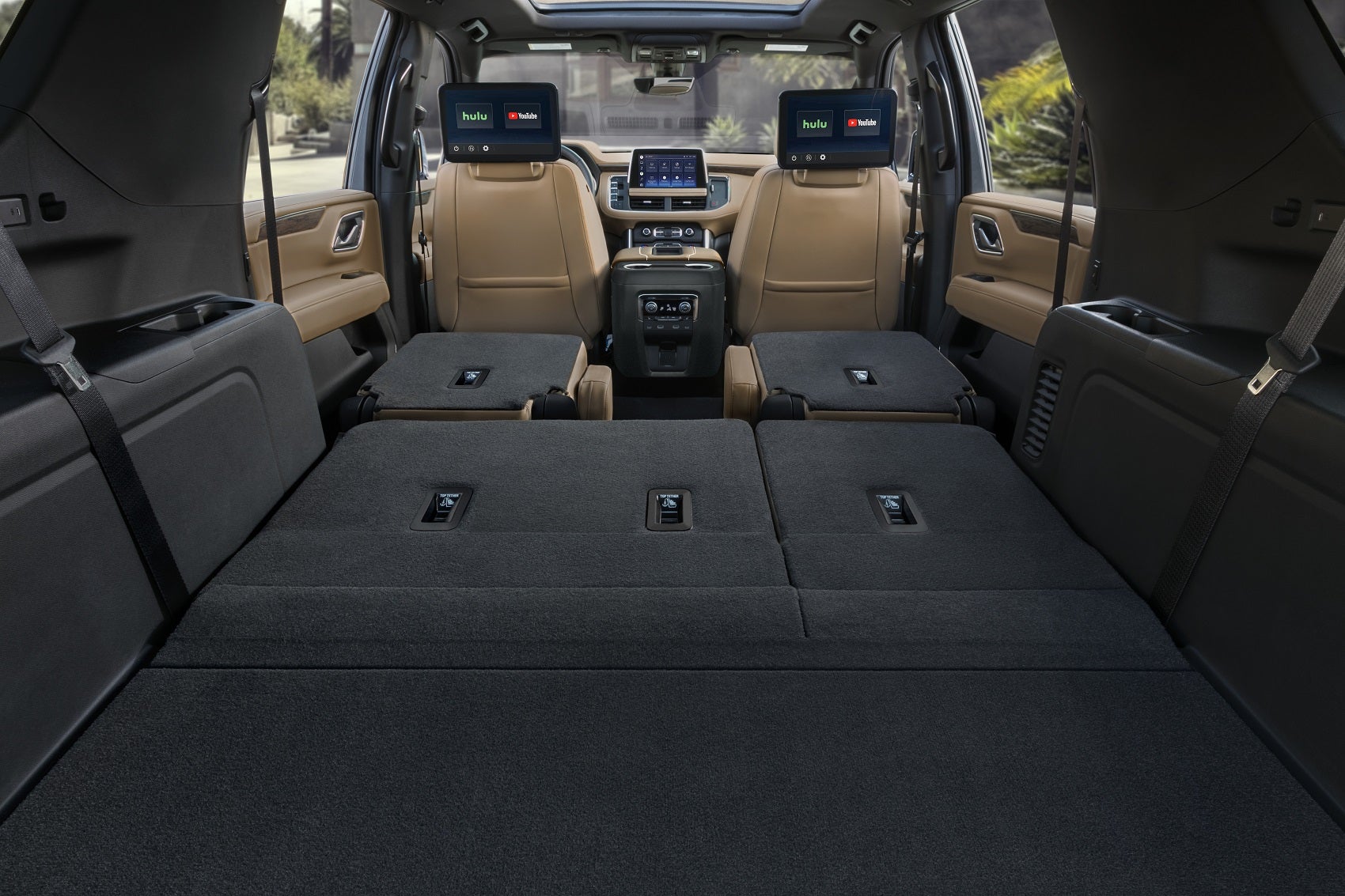 the empty back of a chevy suburban shows its large cargo space